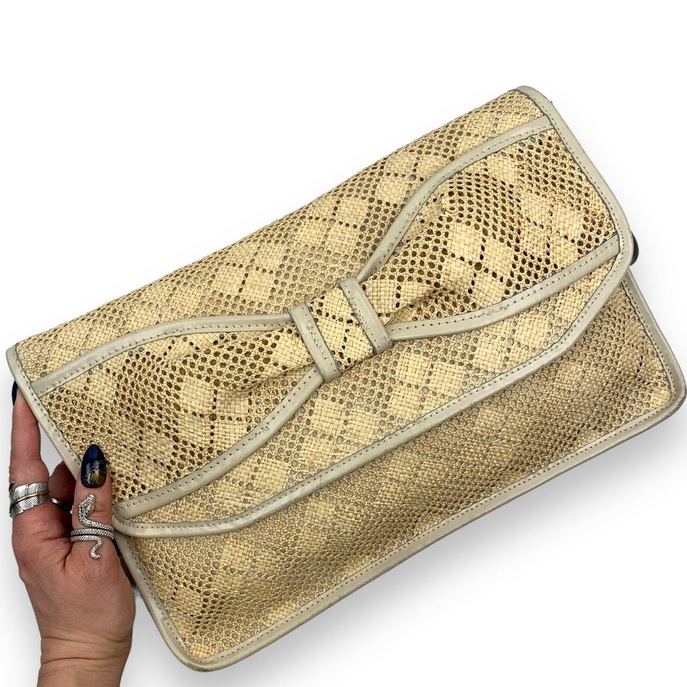 1970's large bow raffia straw and leather wristlet bag